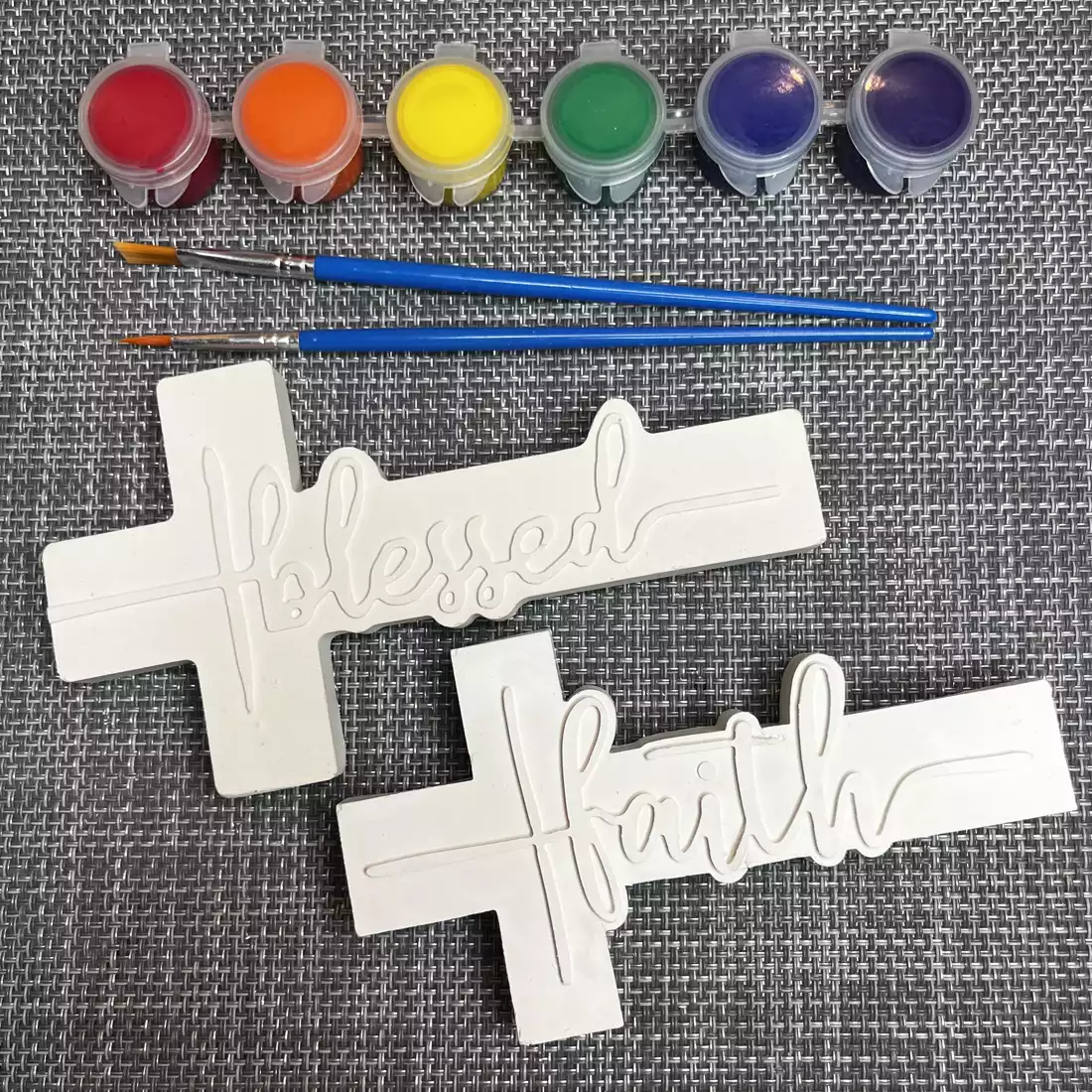 Plaster crosses lettered Blessed and Faith, with paint and two brushes